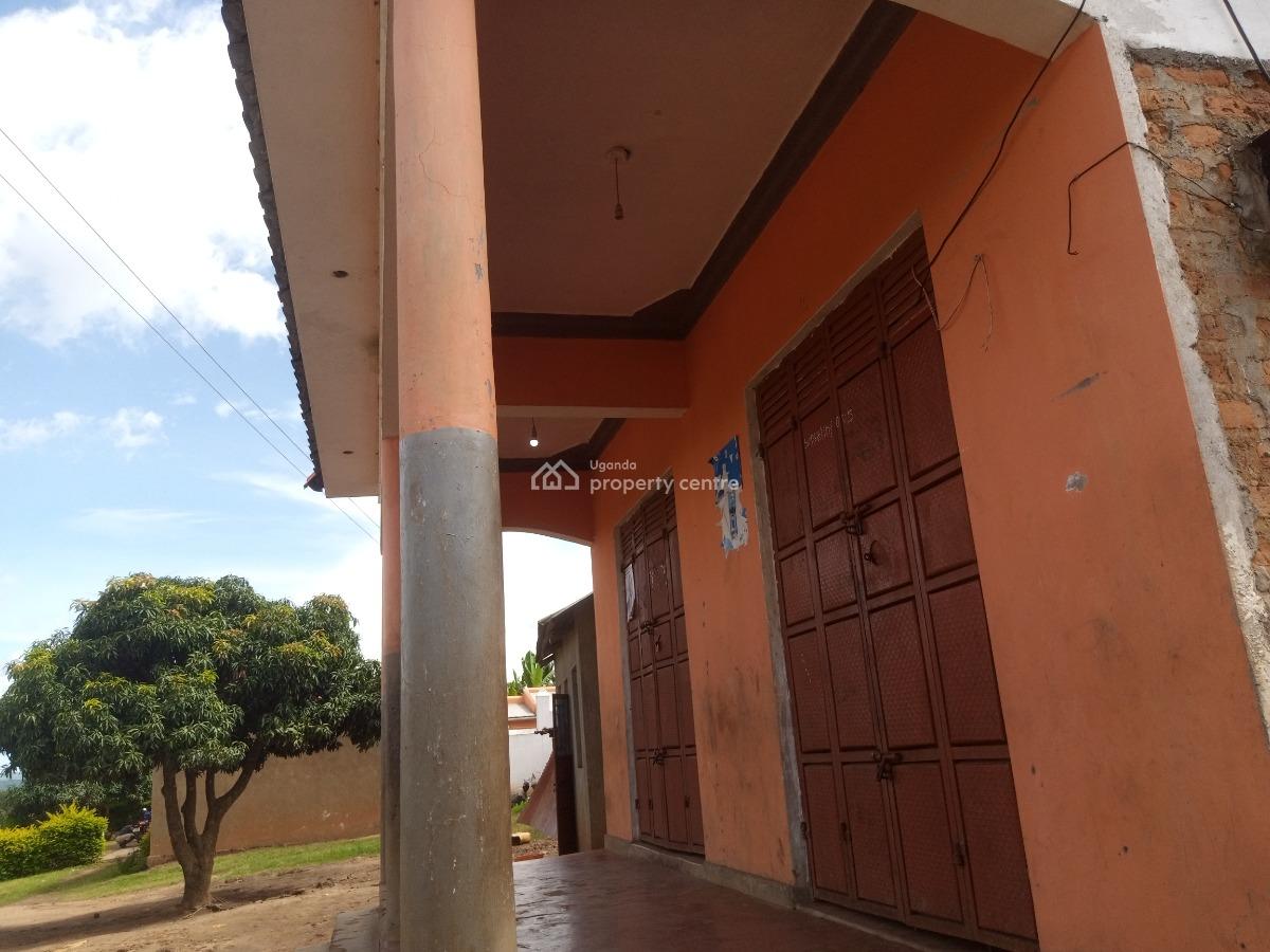 a Four Roomed Commercial House Along The Tamarc Road with Ekyishaye Ki, 27 Miles Kikagate Road, Isingiro, Western Region, Shop for Sale