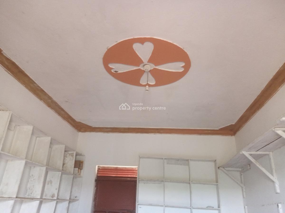 a Four Roomed Commercial House Along The Tamarc Road with Ekyishaye Ki, 27 Miles Kikagate Road, Isingiro, Western Region, Shop for Sale