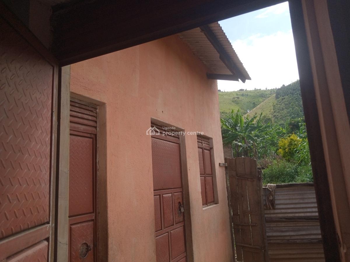 a Four Roomed Commercial House Along The Tamarc Road with Ekyishaye Ki, 27 Miles Kikagate Road, Isingiro, Western Region, Shop for Sale